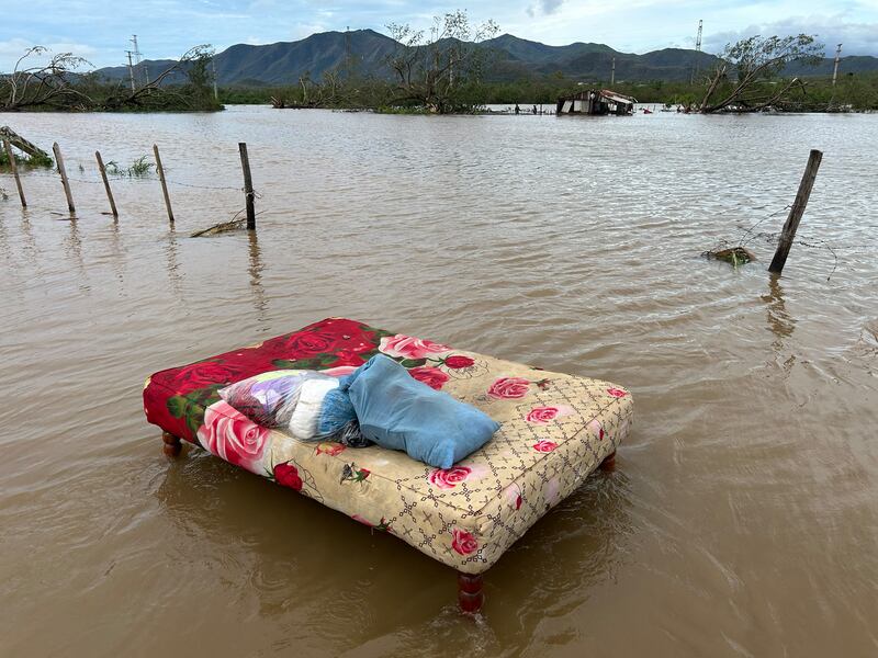 A bed washed away by floods is seen after the passage of Hurricane Melissa through the town of San Miguel de Parada in Santiago de Cuba province, Cuba, on Wednesday. Photograph: Yamil Lage/AFP via Getty Images         