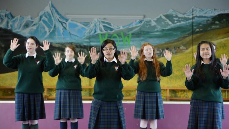 Members of the choir rehearsing at the school in Cabra for Christmas carol performances. Photograph: Alan Betson
