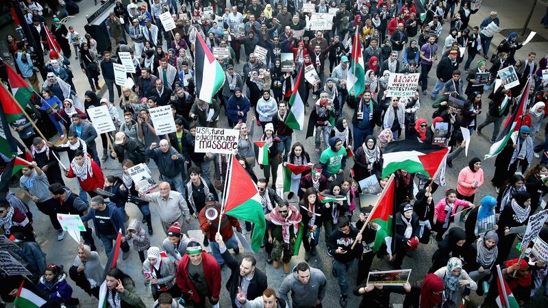 Demonstrators march in the Loop in Chicago protest over what they perceive as Israeli aggression in the occupied West Bank and Gaza. Photograph: Getty