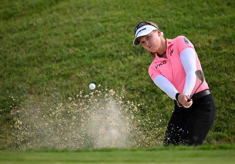 Brooke Henderson of Canada plays a shot from a bunker on the 18th hole on day two of the Amundi Evian Championship in Evian-les-Bains, France. Photograph: Stuart Franklin/Getty Images