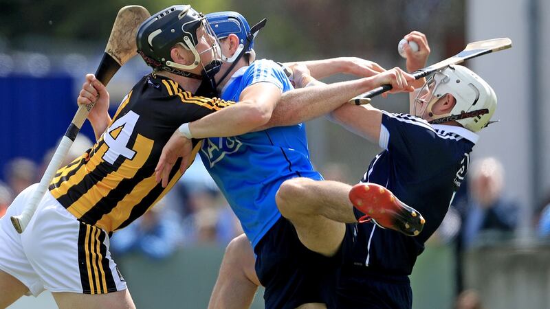 Alan Nolan takes the ball under pressure from Kilkenny’s Walter Walsh. Photograph: Donall Farmer/Inpho