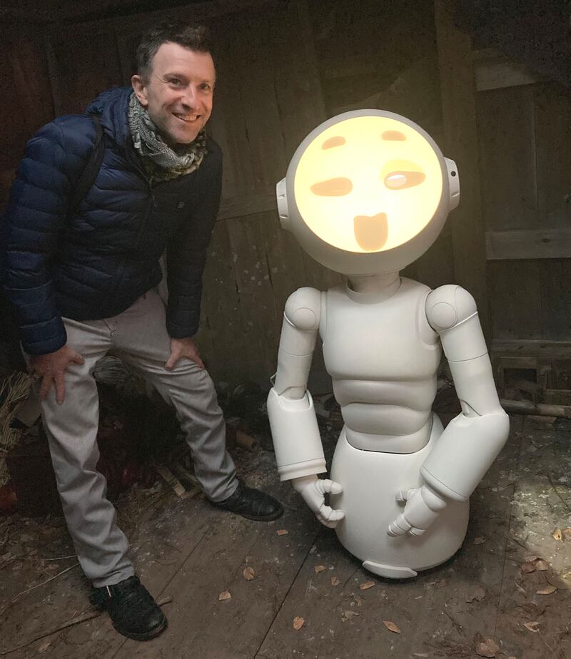 Colin O’Sullivan with Sunny, the robot from the Apple TV+ series of the same name