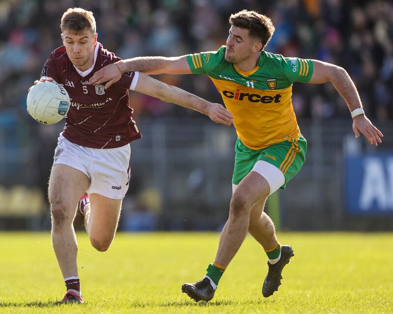Daire Ó Baoill (right) tackles Galway's Dylan McHugh. Ó Baoill has played a key role in Donegal's progress under Jim McGuinness. Photograph: Ben Brady/Inpho