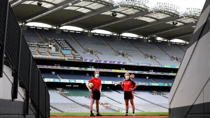 RCSI students Hugh Woulfe  and Róisín Baker take to the pitch in Croke Park. The stadium  will host RCSI medical students this September.