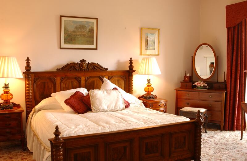 A luxurious bedroom at Castle Grove, a beautiful Georgian house on the banks of Lough Swilly, outside Letterkenny, Co Donegal