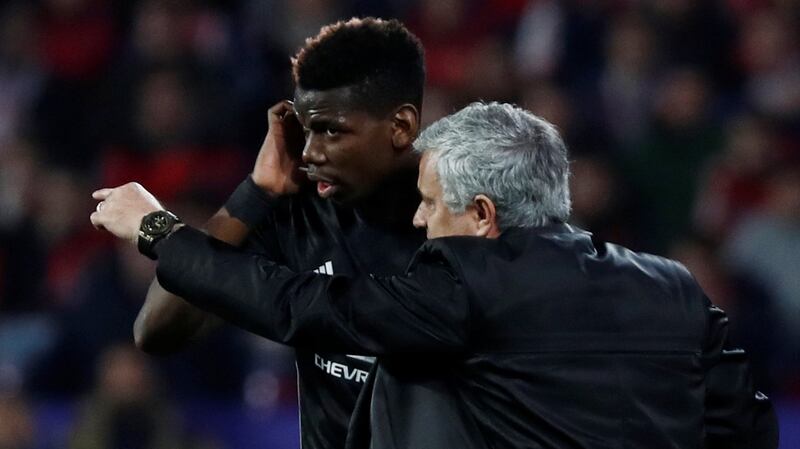 Manchester United manager Jose Mourinho gives instructions to Paul Pogba as the midfielder goes on in the first half of the Champions League round of 16 first leg against Sevilla at the Ramon Sánchez Pizjuán stadium. Photograph: Juan Medina/Reuters
