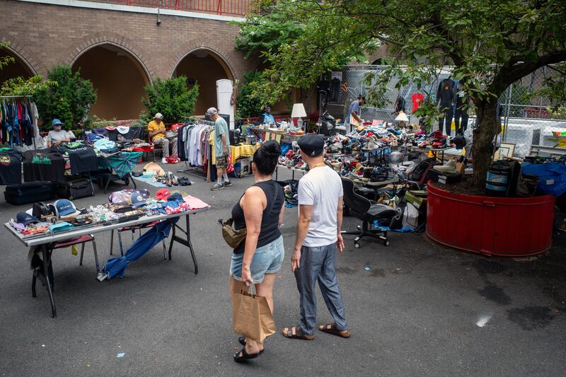 The weekly flea market at the Church of the Immaculate Conception on East 14th Street in Manhattan. Photograph: David Dee Delgado/The New York Times
                      