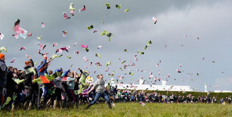 Some 955 people took part in a Guinness World Record attempt at the most people throwing wellies, organized by Youth farming group Macra,  on day two. Photograph: Niall Carson/PA Wire 