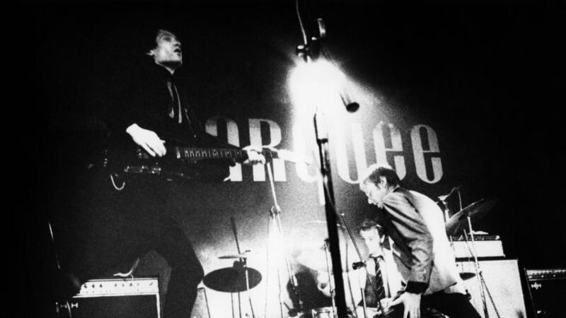 Man in black: Wilko Johnson with Dr Feelgood in 1975. Photograph: Mick Gold/Redferns/Getty