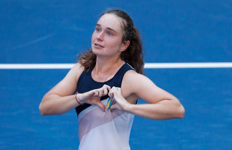 Daria Snigur of Ukraine celebrates after defeating Simona Halep. Photograph: Kena Betancur/AFP via Getty Images
