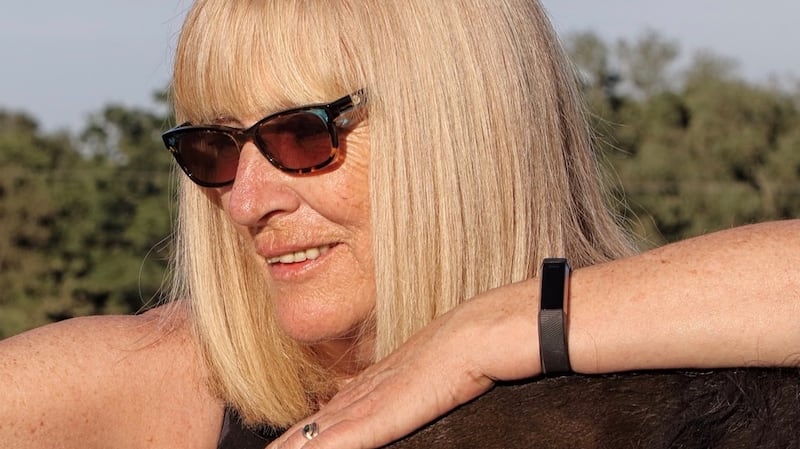 Poet Moyra Donaldson’s sun-lit photo on the back of Carnivorous