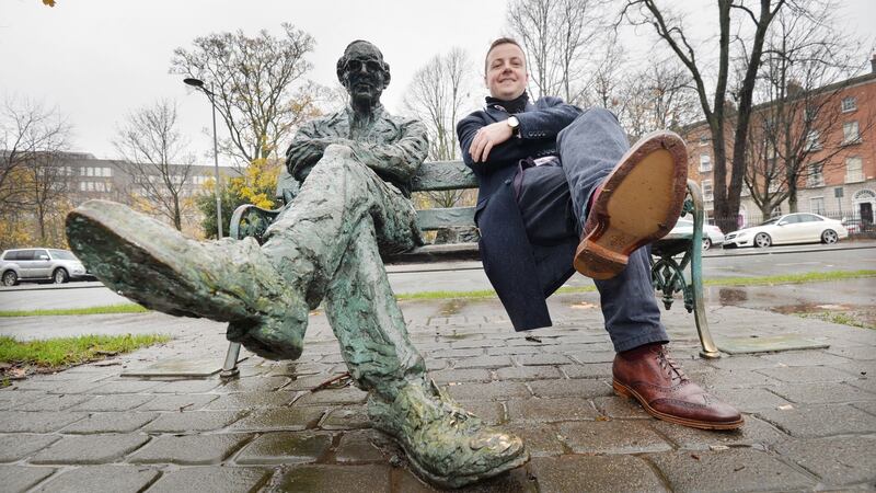 Oliver Callan sits by  the Patrick Kavanagh statue at the Grand Canal in Dublin. Photograph: Alan Betson/The Irish Times