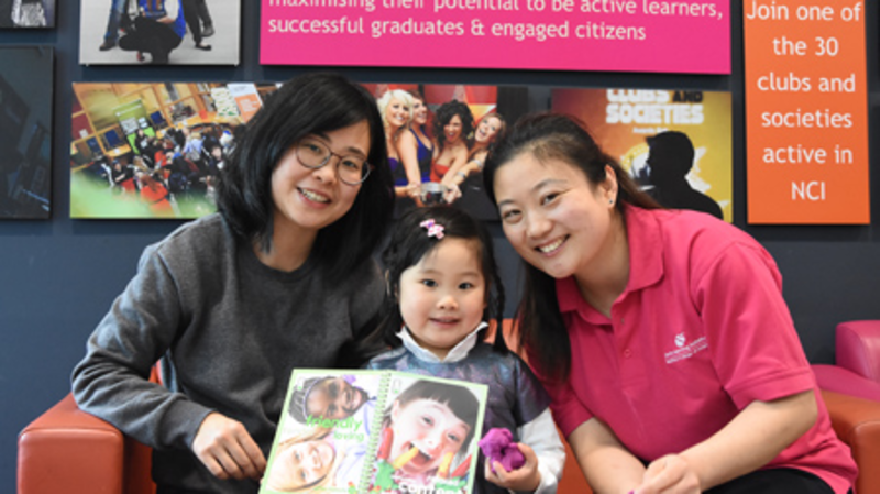 Yan He with her daughter Luxi Shi and ELI home visitor Sue at National College of Ireland for the graduation ceremony