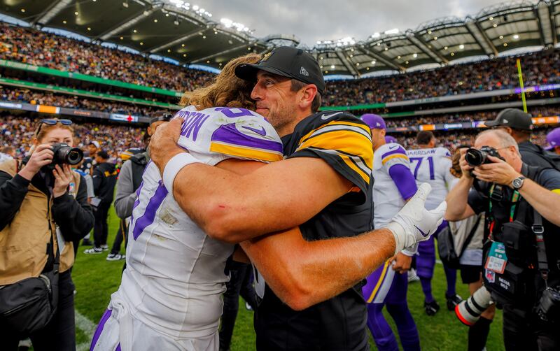 Minnesota Vikings’ TJ Hockenson (left) and Aaron Rodgers of Pittsburgh Steelers at Croke Park on Sunday. Photograph: James Crombie/Inpho