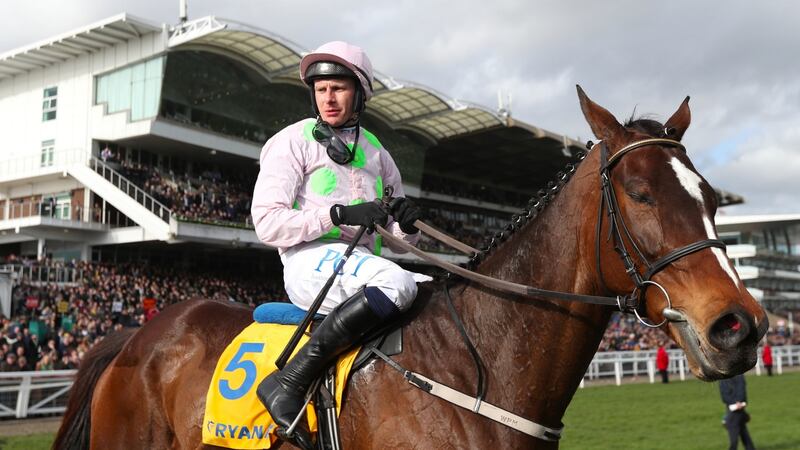 Jockey Paul Townend celebrates winning the Ryanair Chase with Min during day three of the Cheltenham Festival. Photograph: PA