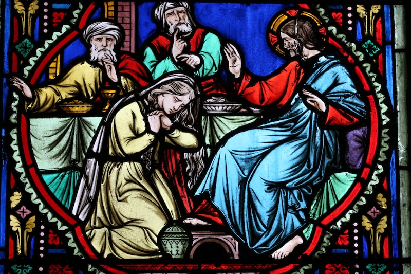Magdalene washing the feet of Jesus in a stained-glass window in Moulins. France. Photograph: Godong/Universal Images Group via Getty
