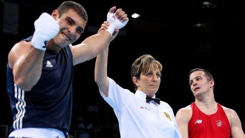 Darren O’Neill is dejected as he loses out on a split decision against Gevorg Manukian of Ukraine in the men’s heavyweight quarter-finals in Baku. Photograph: Ryan Byrne/Inpho