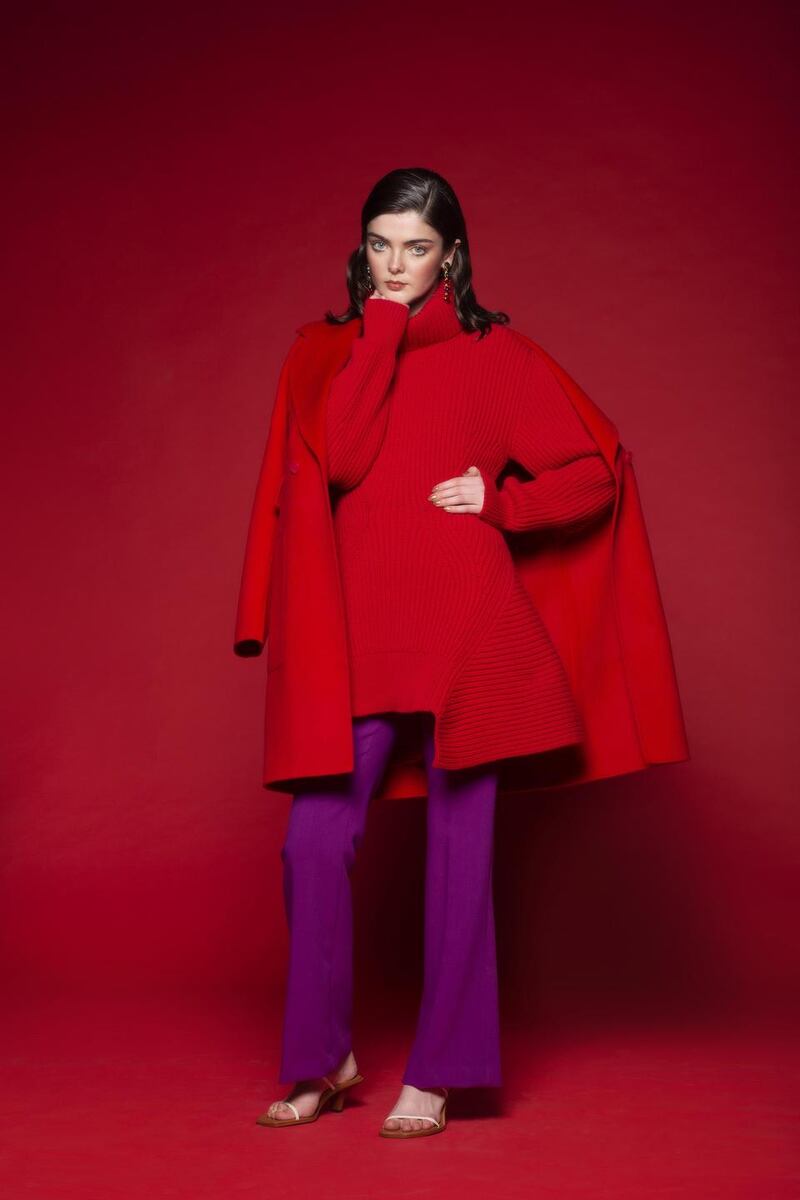 Teardrop earrings, €270, Kenneth Jay Lane, Brown Thomas; red wool coat, €460, Tara Jamon, Arnotts; red knit dress, €990, Alexander McQueen, Brown Thomas; flared trousers, €39.95, Zara; sandals, €460, Neous, Brown Thomas