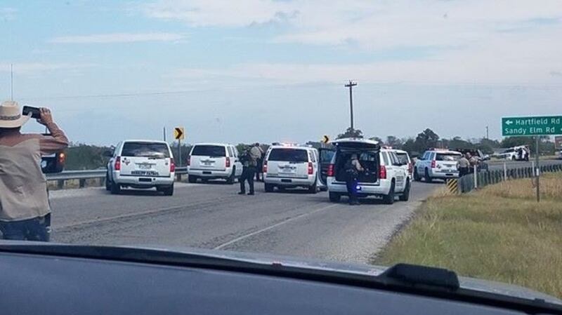Police cars are seen at Sutherland Springs on Sunday, in this picture obtained from social media. Liz Summers/Reuters