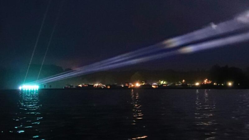 People watching the Light Ballet light installation in Boyle, Co Roscommon on Monday. Photograph: Niall Carson/PA Wire