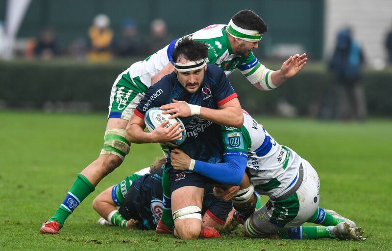 Ulster’s Greg Jones is tackled by Federico Ruzza of Benetton. Jones has joined St Mary's. Photograph: Luca Sighinolfi/Inpho
