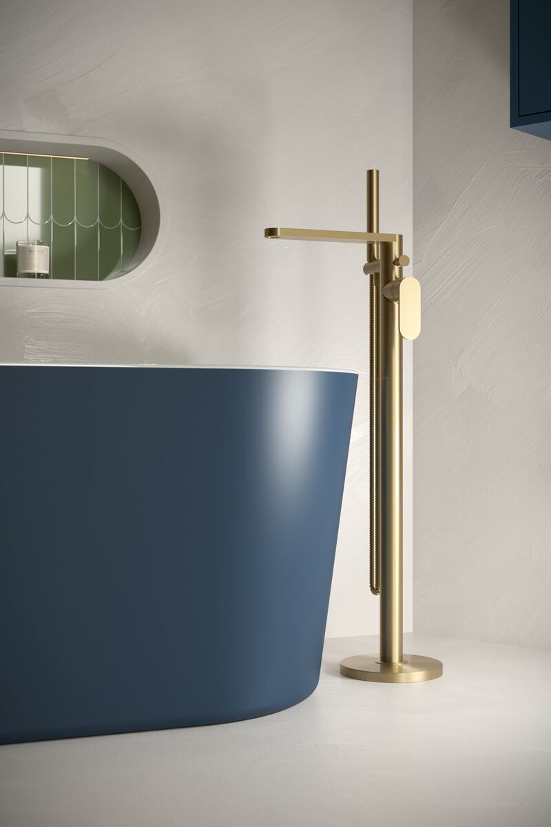 Freestanding baths add a luxe touch. Combine with this brass Urban floor standing mixer tap from Sonas Bathrooms