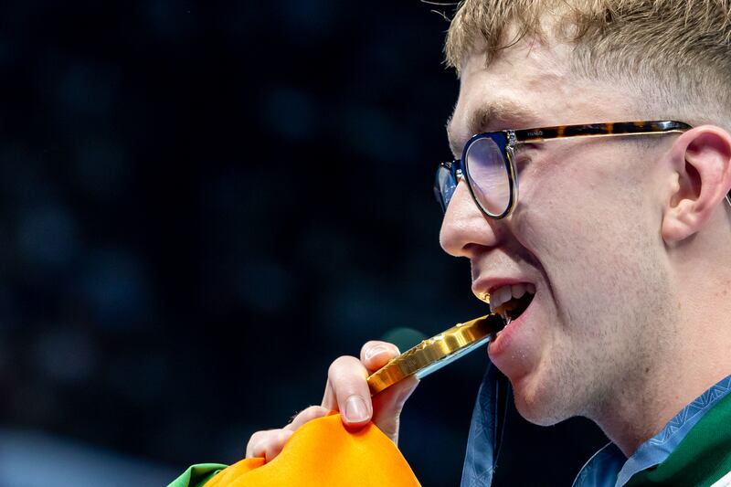 Ireland’s Daniel Wiffen celebrates with his gold medal. Photograph: Morgan Treacy/Inpho