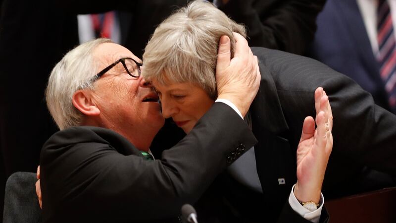 European Commission president Jean-Claude Juncker greets UK prime minister Theresa May. Photograph: Alastair Grant/AP Photo