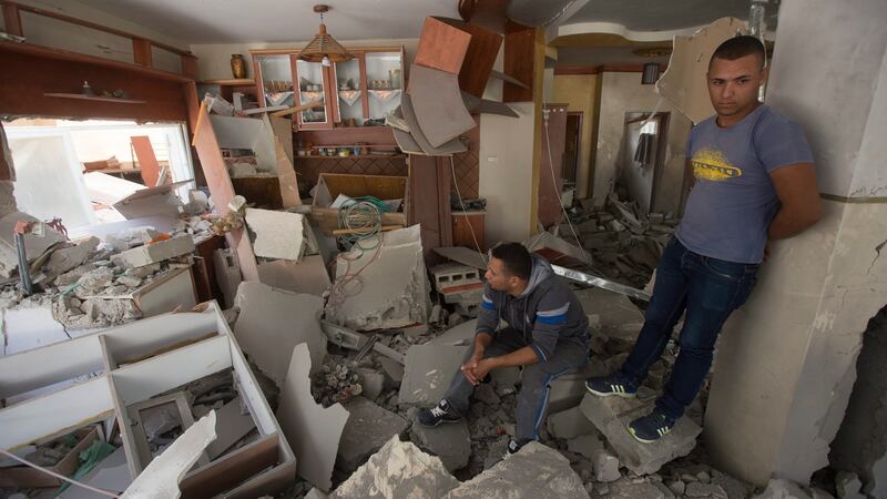 Palestinians inspect  damage at a Palestinian’s  house  after the Israeli army blew it up with explosives, in the Jabal Mukaber neighbourhood,  East Jerusalem,  October 6th, 2015. Photograph: Atef Safadi/EPA