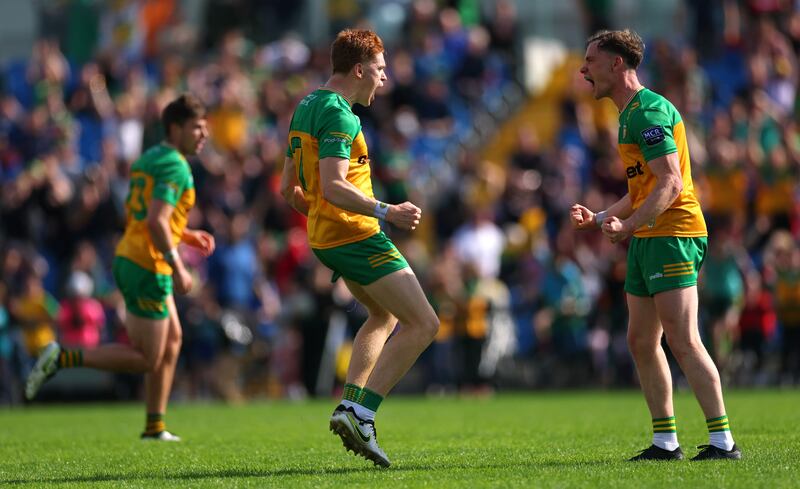 Donegal’s Ciaran Moore celebrates with Ciaran Thompson after the final whistle. Photograph: James Crombie/Inpho