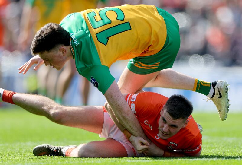 Donegal’s Niall O'Donnell and Armagh's Greg McCabe. Photograph:  James Crombie/Inpho
