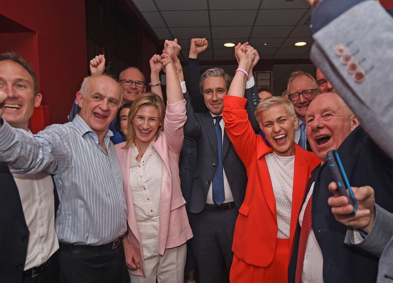 Taoiseach Simon Harris (centre) with Fine Gael's Nina Carberry (centre left) and Maria Walsh (centre right) at the TF Royal Theatre counting centre in Castlebar for the Midlands-North-West constituency. Photograph: Conor McKeown/PA Wire