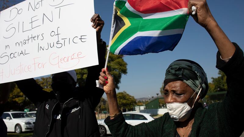 Demonstrators during a Black Lives Matter protest outside the US embassy of in Pretoria, South Africa. Photograph: Kim Ludbrook /EPA