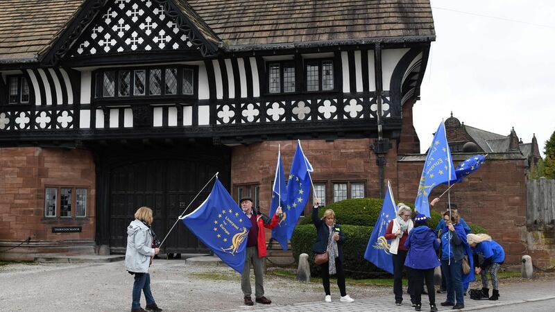 Anti-Brexit demonstrators protest outside Thornton Manor Hotel, near Birkenhead, north-west England. Photograph: Leon Neal / AFP