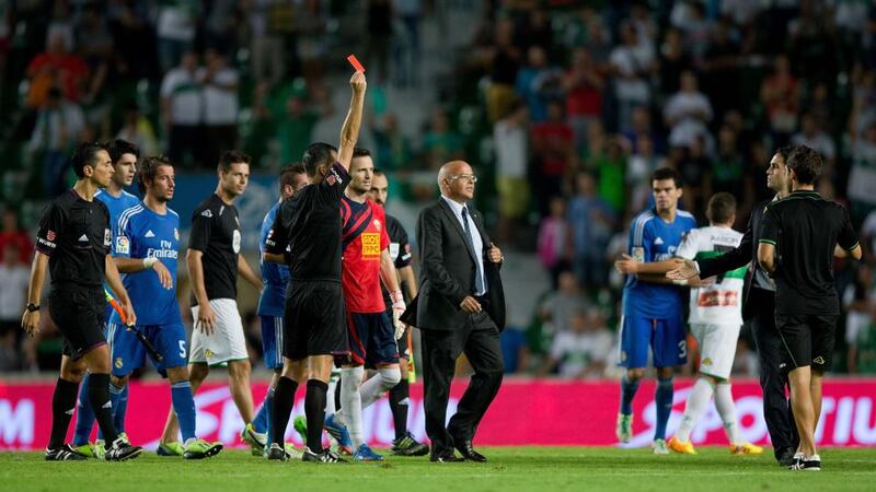 Referee Cesar Muniz Fernandez shows the red card to Carlos Sanchez of Elche after the La Liga match against  Real Madrid  at Estadio Manuel Martinez Valero in September. Photograph:  Gonzalo Arroyo Moreno/Getty Images