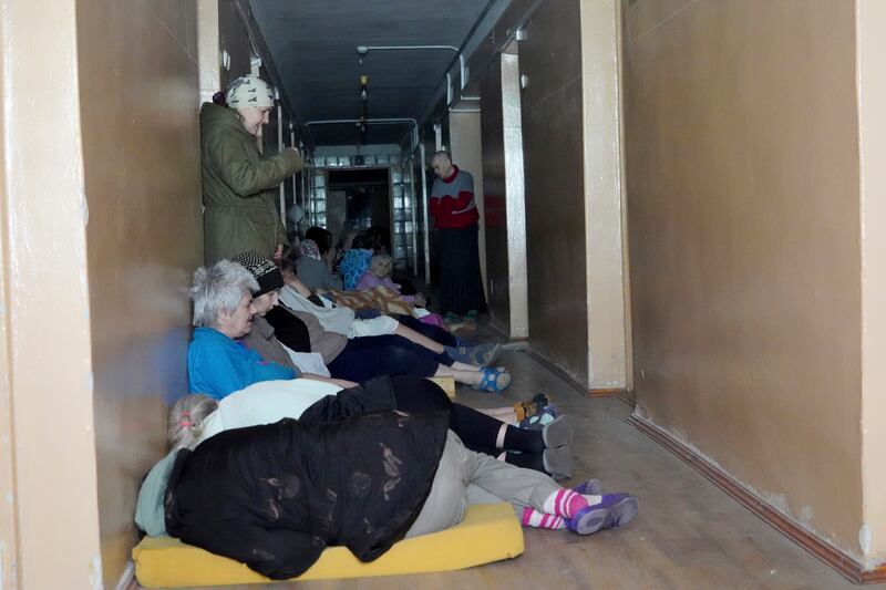 Patients take cover after a Russian attack on psychiatric hospital in Kharkiv, Ukraine. Photograph: Andrii Marienko/AP
