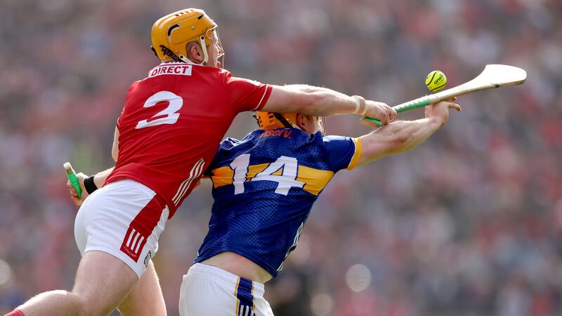 Cork’s Eoin Downey challenges Tipperary's Jake Morris during the final. Photograph: James Crombie/Inpho 