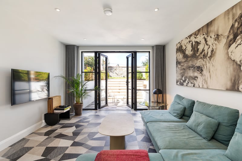 Den at basement level