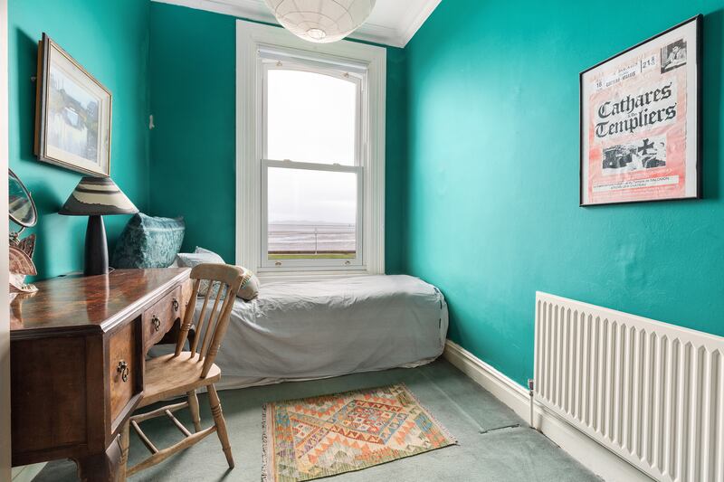 Small bedroom with sea views.