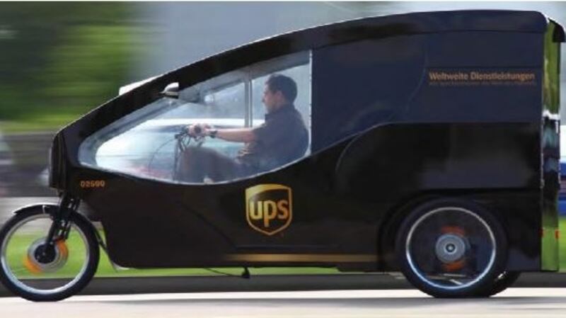 Electronically assisted tricycles, as well as individuals on foot, will be used to deliver packages to and from the container. Photograph: UPS