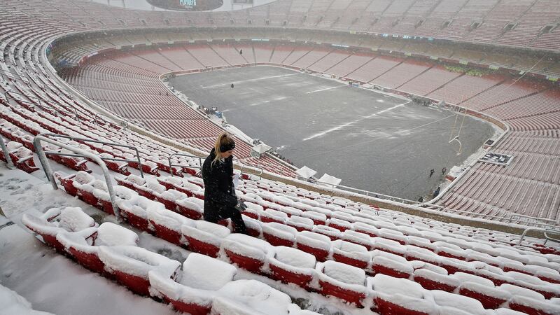 Snow covered the Arrowhead Stadium before the game. Photo: Larry W Smith/EPA