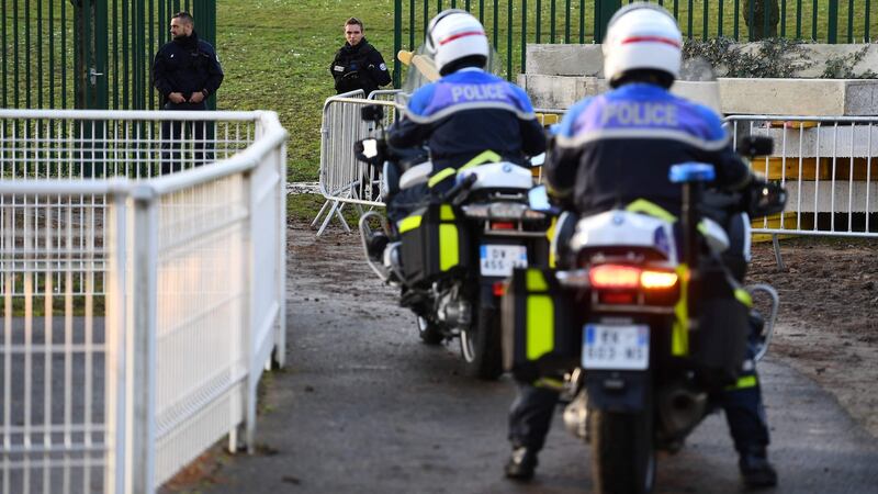 Police officers at the scene where a man was shot and killed by officers after stabbing passersby. Photograph: Getty