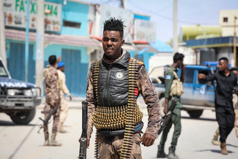 Security officers patrol near the destroyed Hayat Hotel after a deadly 30-hour siege by Al-Shabaab in Mogadishu on August 21st, 2022. At least 13 civilians lost their lives and dozens were wounded in the gun and bomb attack. Photograph: Hassan Ali Elmi/Getty Images