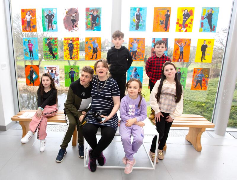 Artist Kate Murtagh Sheridan with some of the children at the exhibition. Photograph: Brian Farrell