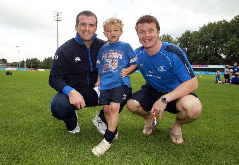 Shane Jennings and Brian O'Driscoll pictured in 2010 with Luke Schmidt son of then-Leinster coach Joe Schmidt. Photograph: INPHO/ Donall Farmer
