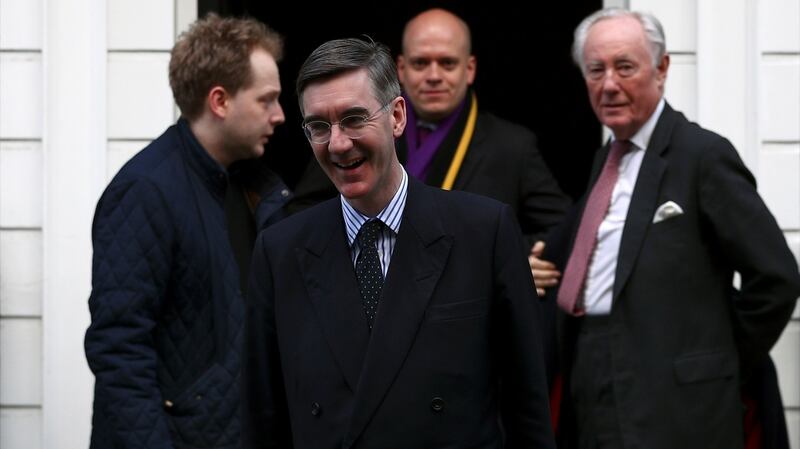 Jacob Rees-Mogg walks down a street in Westminster, London, Britain, on Wednesday. Photograph: Hannah McKay/Reuters