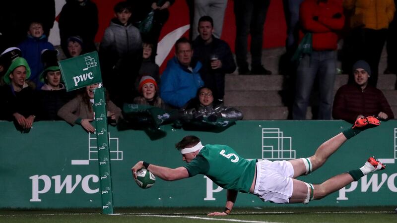 Thomas Ahern dives to score Ireland’s fifth try. Photograph: James Crombie/Inpho