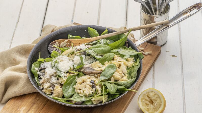 Orzo with mushrooms, spinach, lemon and Parmesan. Photograph: Harry Weir