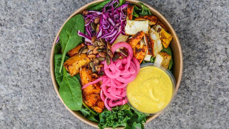 The new spicy Indian chicken bowl at Sprout, made with leaves grown organically in Co Kildare.