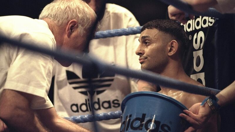 Brendan Ingle gives  Prince Naseen Hamed  advice during the world title fight with  Remigio Molina  at the Nynex Arena in Manchester in November 1996. Hamed won the fight after a TKO in the second round. Photograph:  John Gichigi/Allsport